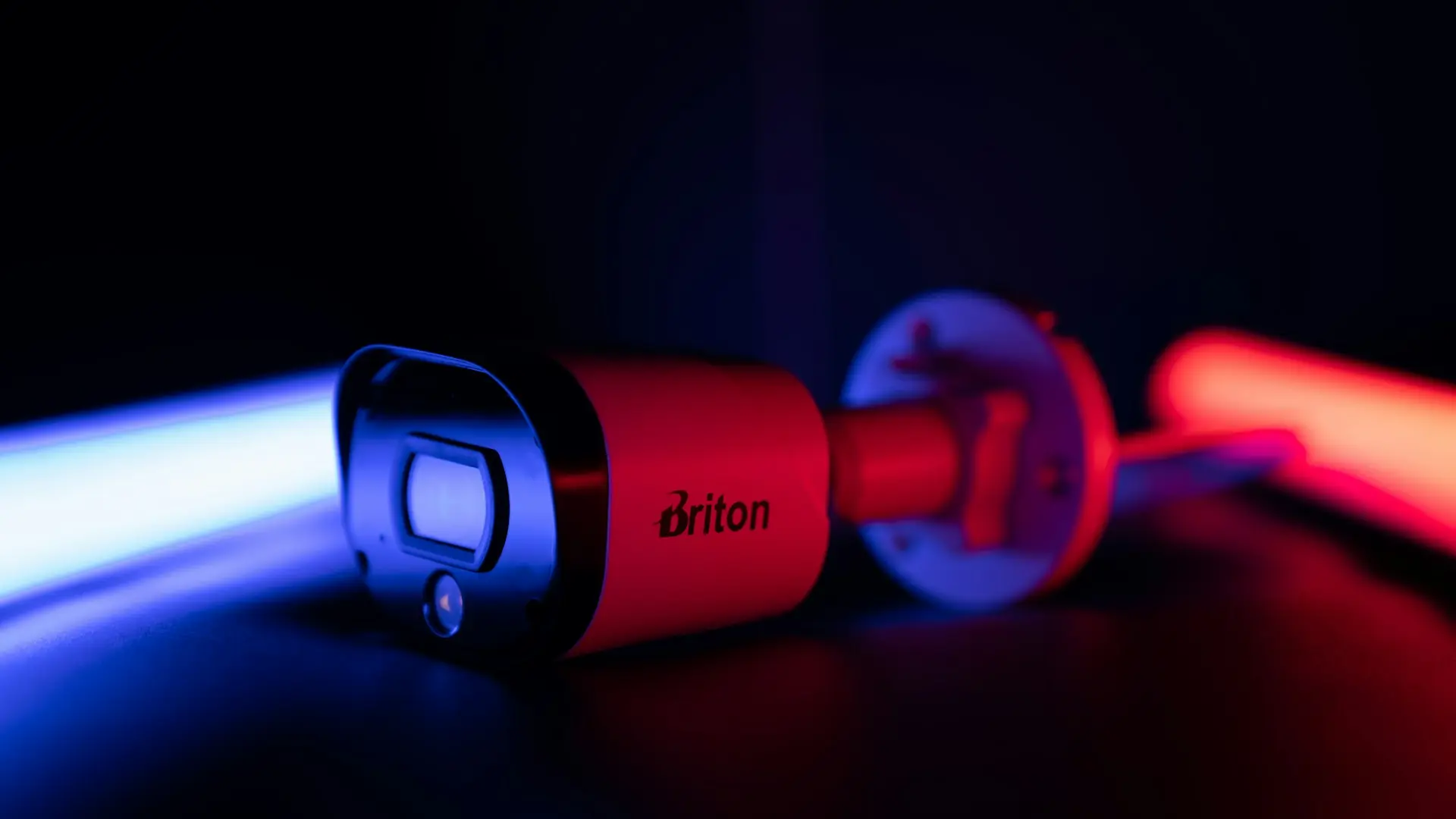 a close up of a flashlight on a table