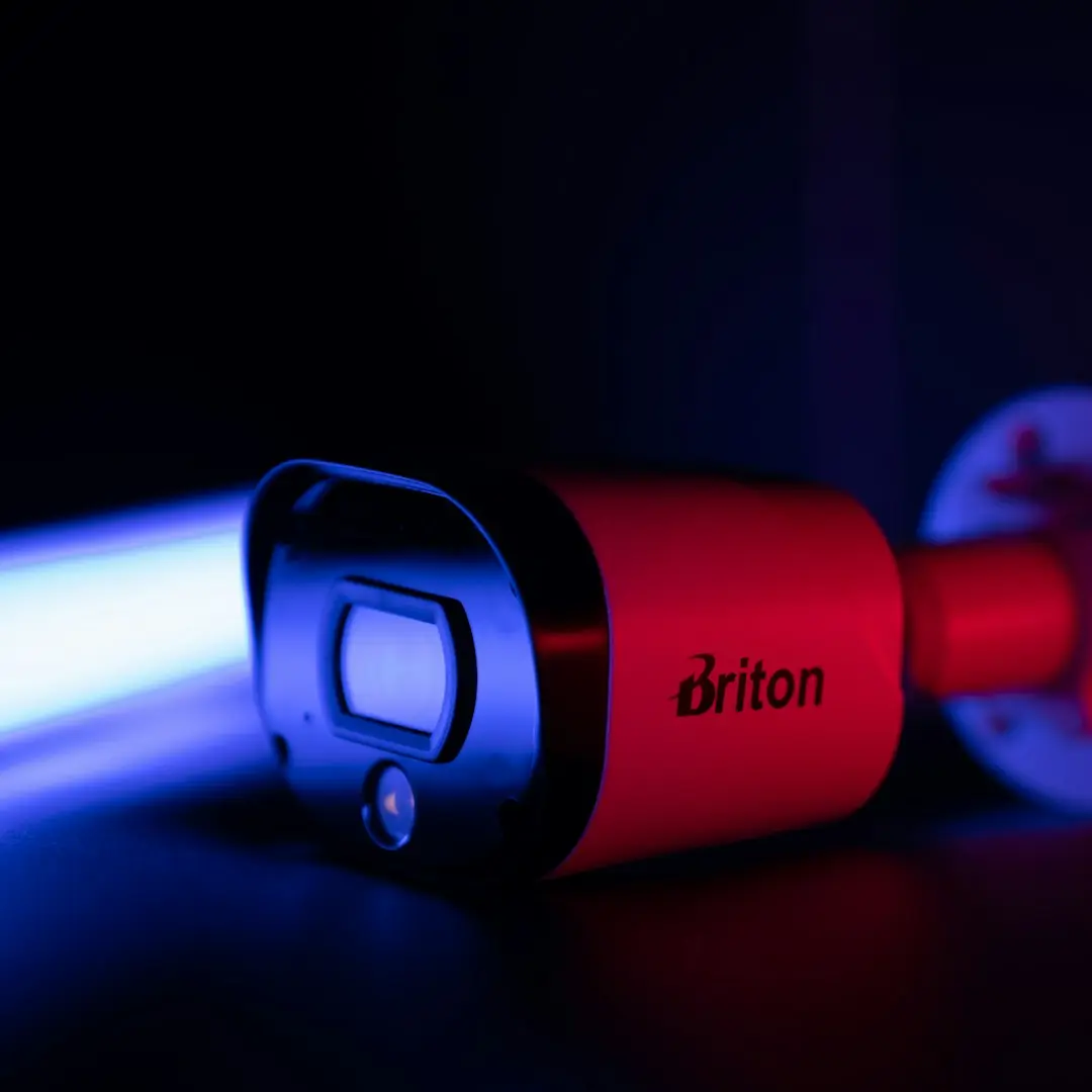 a close up of a flashlight on a table